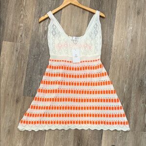 Elegant Orange and Cream Knit Swim Coverup . 13 in PTP. 32 in long.